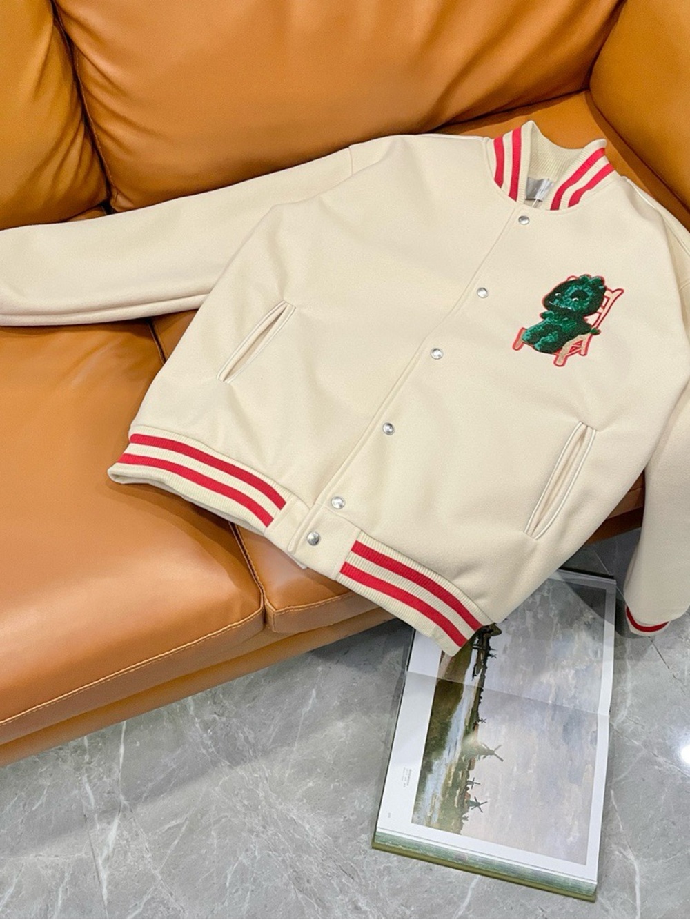 Dior Cream Kids' Bomber Jacket with Red Stripe Trim and Green Patch
